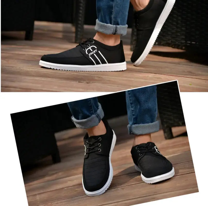 Men's breathable casual sneakers in black with white soles, designed for comfort and style on wooden surface.