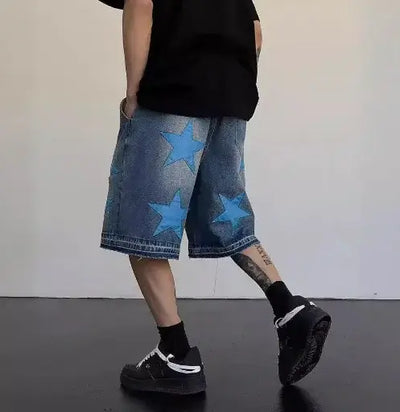 Man wearing Vintage Star Patch Jeans featuring blue star detailing with a modern fit, showcasing casual style.