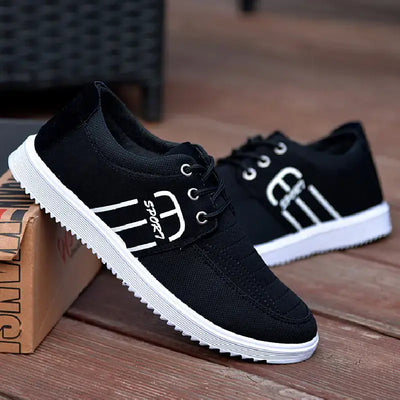 Men's breathable black casual sneakers with white accents and durable outsole for all-day comfort.