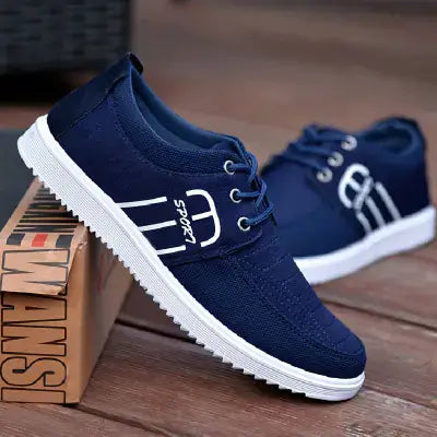 Men's breathable casual sneakers in navy blue, featuring a lightweight design and cushioned insole for comfort.