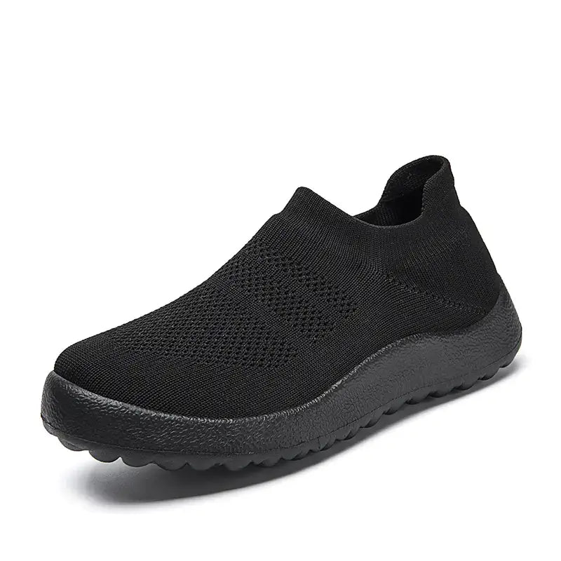 Black Casual Flyknit Slip-On Sneakers featuring a lightweight and breathable upper for all-day comfort.