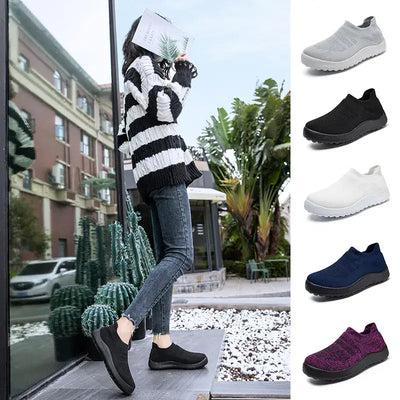 Woman wearing Casual Flyknit Slip-On Sneakers with plant backdrop and sneaker color options beside