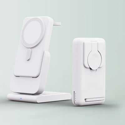 Magnetic power bank and wireless charger duo in sleek white design for fast, convenient device charging.